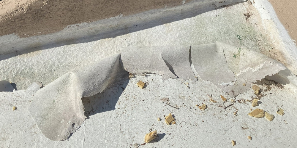 Old Foam Roof with Damage in Scottsdale